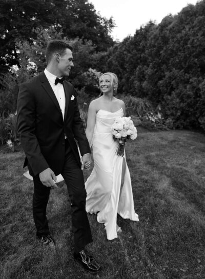 The bride and the groom are looking at each other