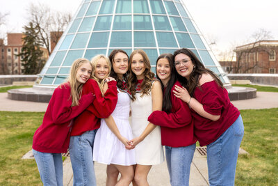 Cap and gown pictures with a group of female friends at Washington State University