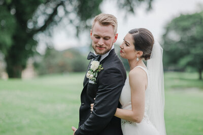 Bride and Groom embrace at the Chevy Chase Country Club in Wheeling, Illinois.