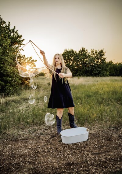 a goldendoodle at a family photoshoot in the colony texas