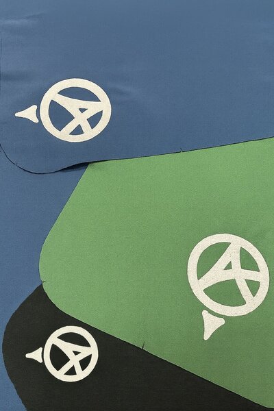 Over Armor Golf Bag colors in blue, green, and black.