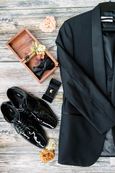 flatlay of groom's clothes