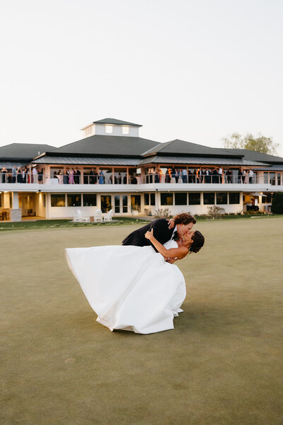 couple outside royal golf club 
