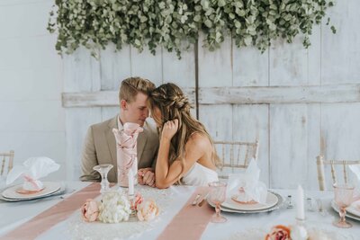 Lake Tahoe Elopement Photographer captures bride and groom whispering together