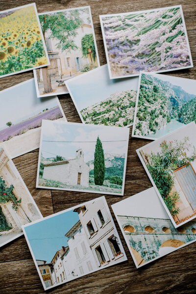 assortment of french postcards from provence, including valensole lavender fields, luberon villages, an the pont du gard in nîmes