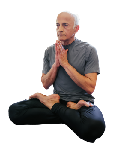 Dr Gopal cross legged in meditation