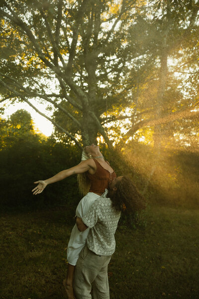 Couple dancing in the rain in Rhode Island