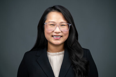 Professional NJ studio headshot of woman with natural smile by Alex Kaplan Photography