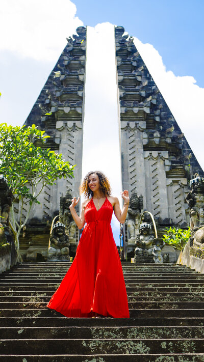 dr. eva yacobi at a temple in bali embracing all things women's holistic health and pleasure