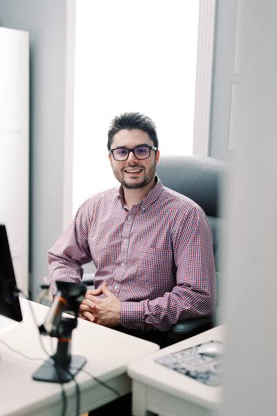 WhitenUp owner, Reece, smiling from his office, eagar and excited about WhitenUp and giving people their brightest smile.