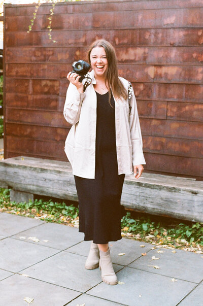 Woman wearing a hat and smiling