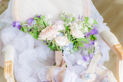 a soft lilac wedding bouquet with beautiful fresh florals
