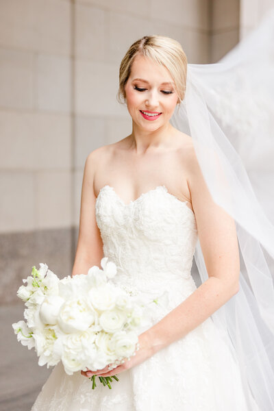 Bride with classic wedding florals. Wedding florist for Maryland's Eastern Shore.