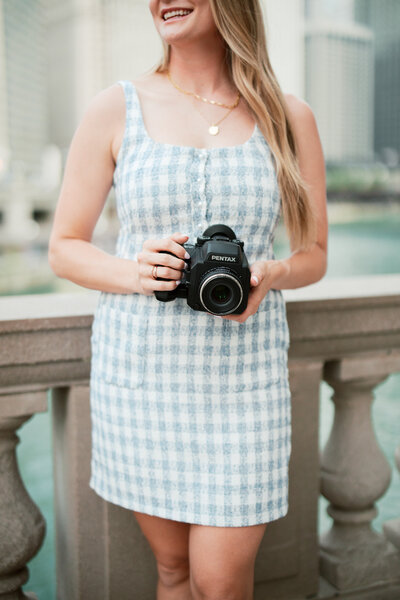 woman holding camera