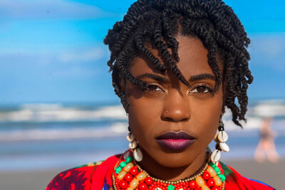 BLACK WOWAN HEAD SHOT ON BEACH