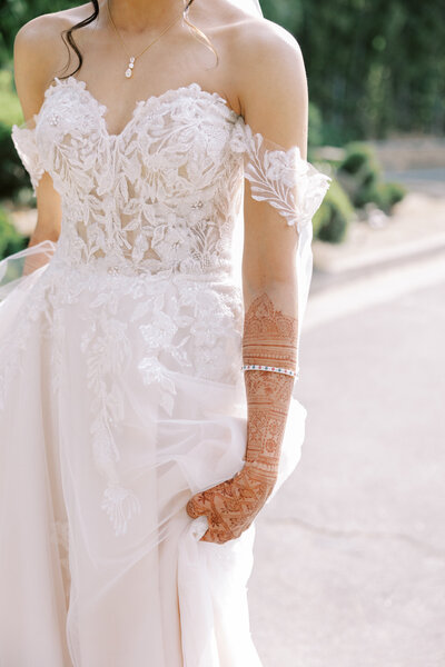 Dress flowing in the wind during elegant bridal portrait | Fresno wedding photographer