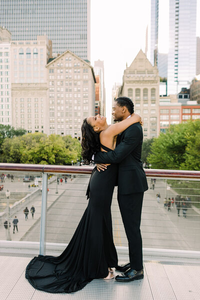 A candid engagement photo captured on the Nichols Bridgeway