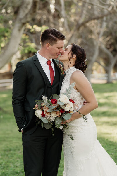 bride and groom romantic kiss at Walnut Grove Weddings