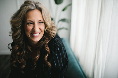 portrait of woman with fabulous hair smiling