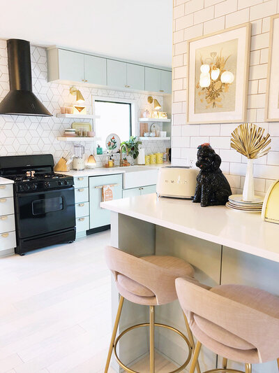 Interior photo of a light and pastel colored kitchen