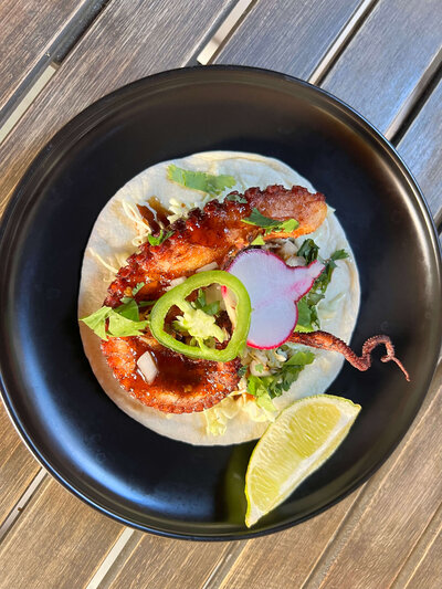 seafood taco on plate