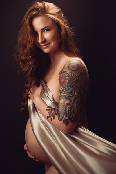 Elegant moment captured by Art of You Boudoir in an Austin Maternity photo session.
