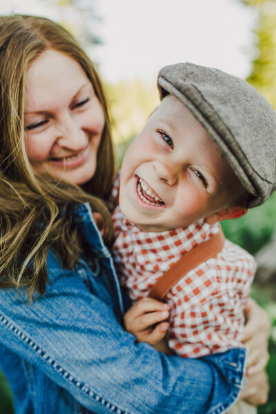Mother and son smiling and laughing.
