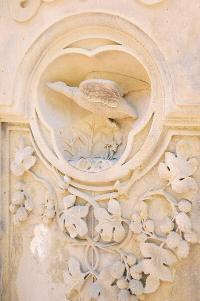 Stone Masonry of a bird  at Central Park, captured by Proposal Photographer in New York, Central Park.  Corey Lamar Photography