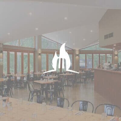 Empty Restaurant overlayed with Flame with fork logo