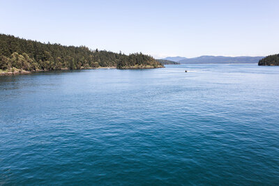 The waters of Puget Sound are a brilliant blue from a ferry ride to Orcas Island