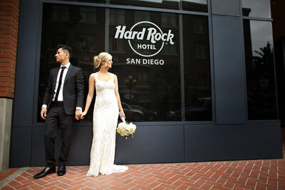 Bride and Groom kissing at their wedding at Hard Rock Hotel  San Diego
