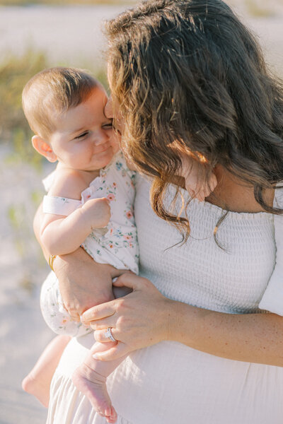 In Home Photos of a Pregnant Mom in a White Dress