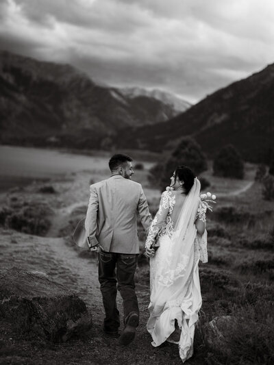 Couple walking towards the camera in Rocky Mountain National Park