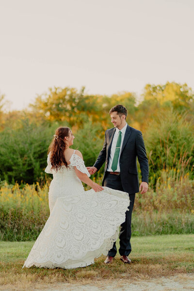 Intimate wedding photos of bride and groom dancing