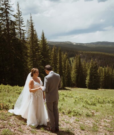 bride and groom exchanging vows