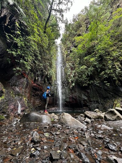 woman by waterfall