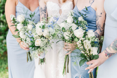 bridesmaids holding bouquets detail shot during wedding photo session in albany ny