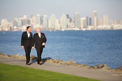 Same Sex couple Groom and Groom walking at their wedding at Tom Hams Lighthouse