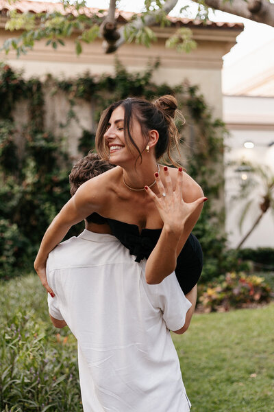 indie west engagement session portfolio image of couple showing off engagement ring