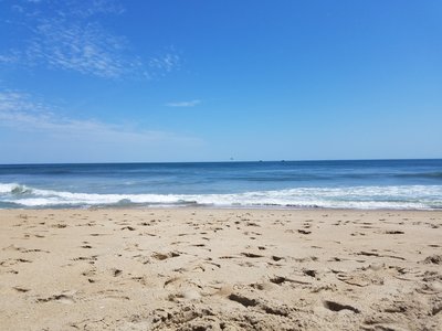 waves crash on a beach at the Outer Banks