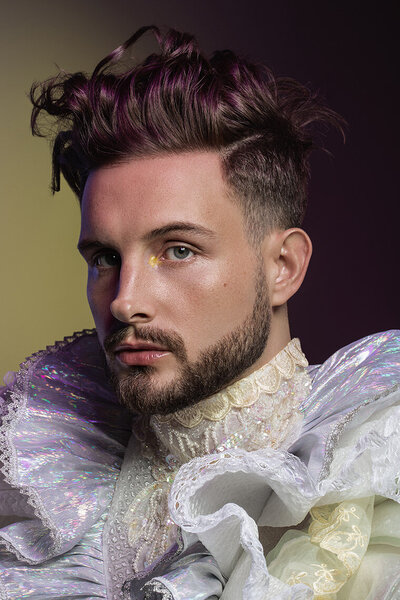 Expressive portrait of Nico Tortorella in a relaxed pose, shot by Ylva Erevall.
