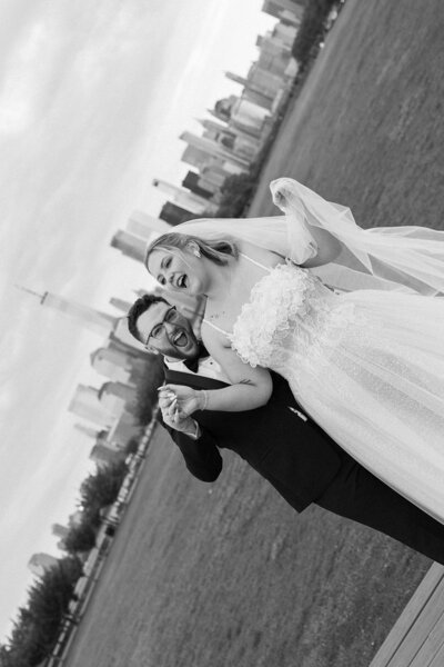 Bride and groom walk up memorial steps at their DC wedding