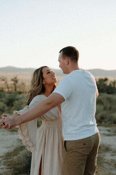 A newly engaged couple at joshua tree national park in california