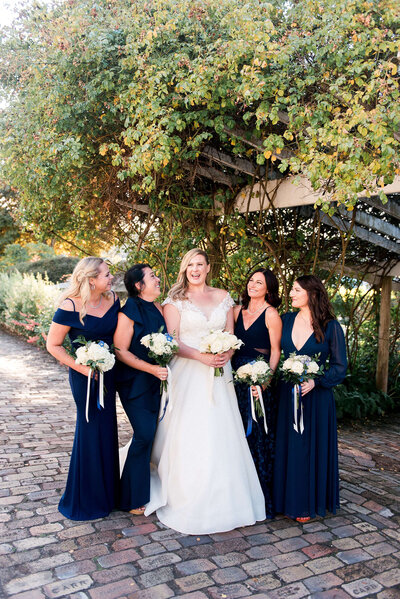Bride with bridesmaids at Roche Harbour Resort 