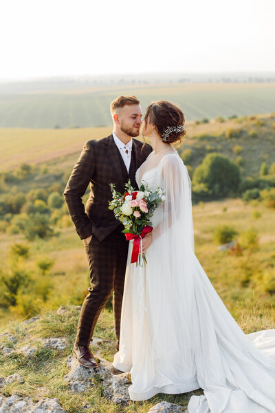 loving-couple-wedding-newlyweds-outside-sunset-beautiful-summer-day