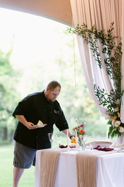 In House Chef, Jason Maley, serving the bride and groom at their wedding at the Messina Inn