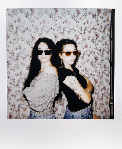 huntsville polaroid photographer in front of brick wall