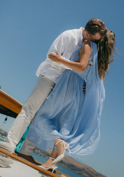 Cinematic couples photo on a boat in Marin County. Romantic, dramatic, editorial couples. Boat photography.