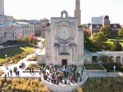 Beautiful Cathedral wedding with a group of people standing outside