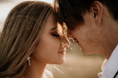 Closeup newlyweds touching noses | Jess Smith Photography